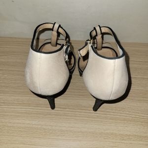Cream/black heels